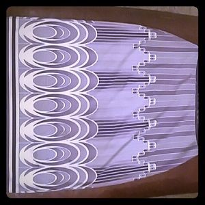 Pretty, purple and white form fitting skirt.